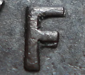 Re-engraved F in NEWF