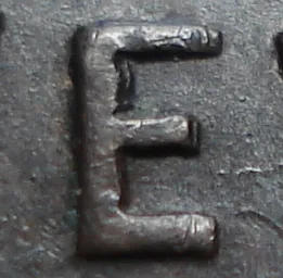 Re-engraved E in NEWF