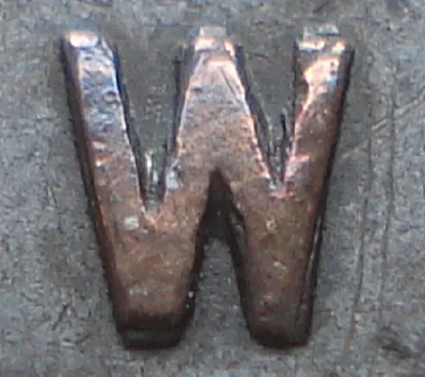 Re-engraved W in NEWF