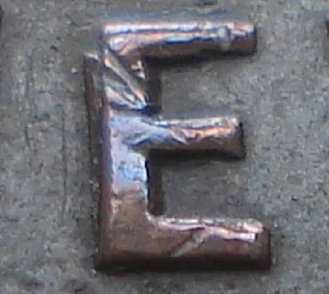 Re-engraved E in NEWF