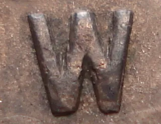 Re-engraved W in NEWF