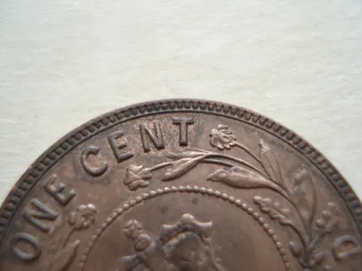 Re-engraved T in CENT