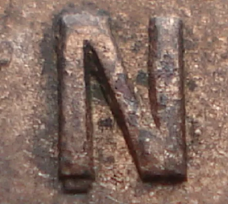 Re-engraved N in NEWF