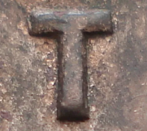 Re-engraved T in CENT