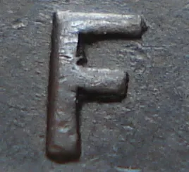 Re-engraved F in NEWF