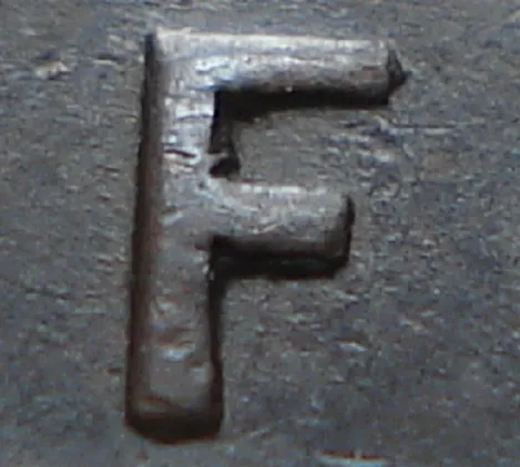Re-engraved F in NEWF