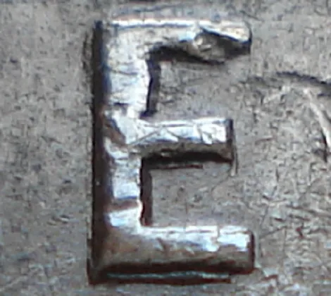 Re-engraved E in ONE