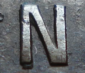 Re-engraved N in NEWF