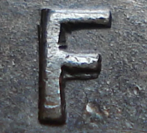 Re-engraved F in NEWF