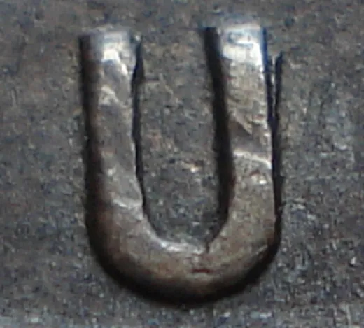 Re-engraved U in OUND