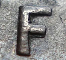 Re-engraved F in NEWF
