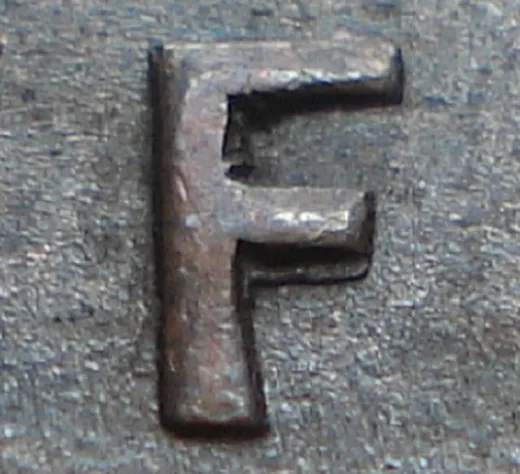Re-engraved F in NEWF