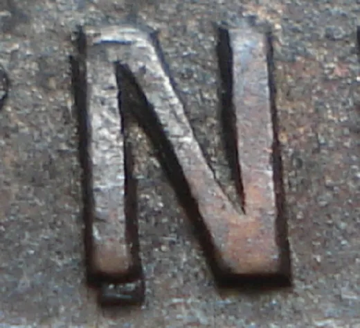 Re-engraved N in NEWF