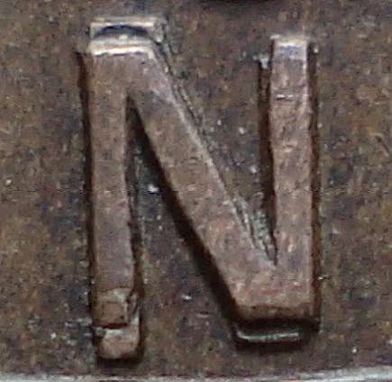 Re-engraved N in LAND