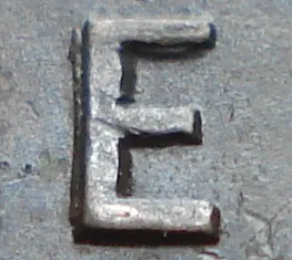Re-engraved E in ONE