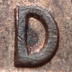 Re-engraved D in LAND