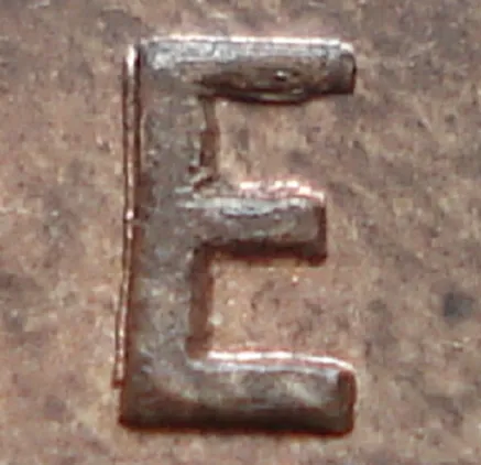 Re-engraved E in ONE