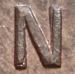 Re-engraved N in ONE