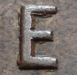Re-engraved E in ONE