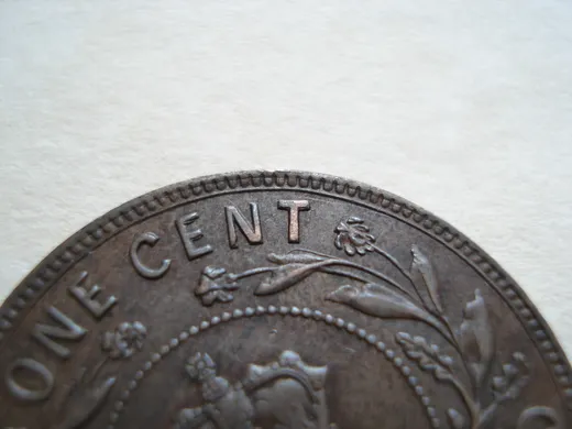 Re-engraved T in CENT