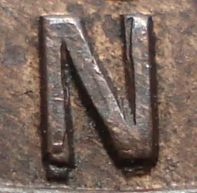 Re-engraved N in LAND