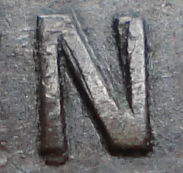 Re-engraved N in NEWF