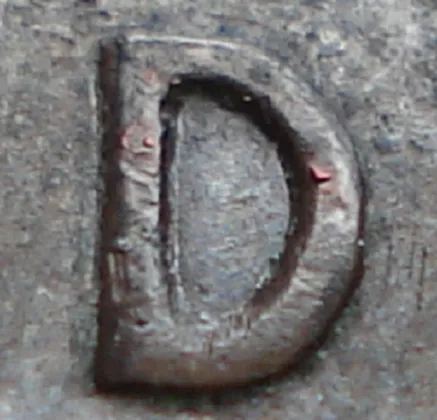Re-engraved D in LAND