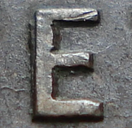 Re-engraved E in NEWF