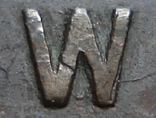 Re-engraved W in NEWF