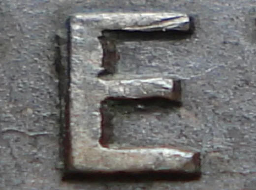 Re-engraved E in NEWF