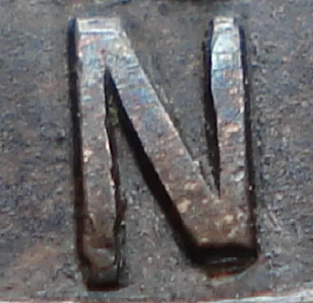 Re-engraved N in LAND