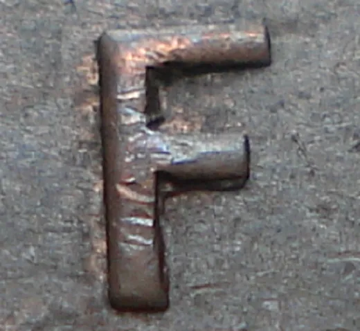 Re-engraved F in NEWF