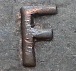 Re-engraved F in NEWF