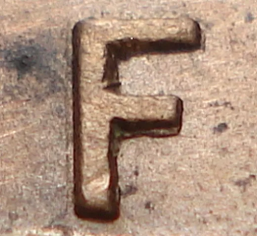 Re-engraved F in NEWF