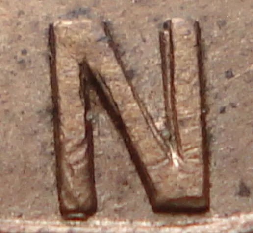 Re-engraved N in LAND