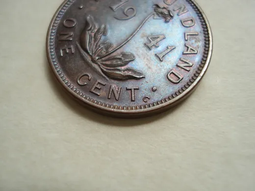 Re-engraved T in CENT